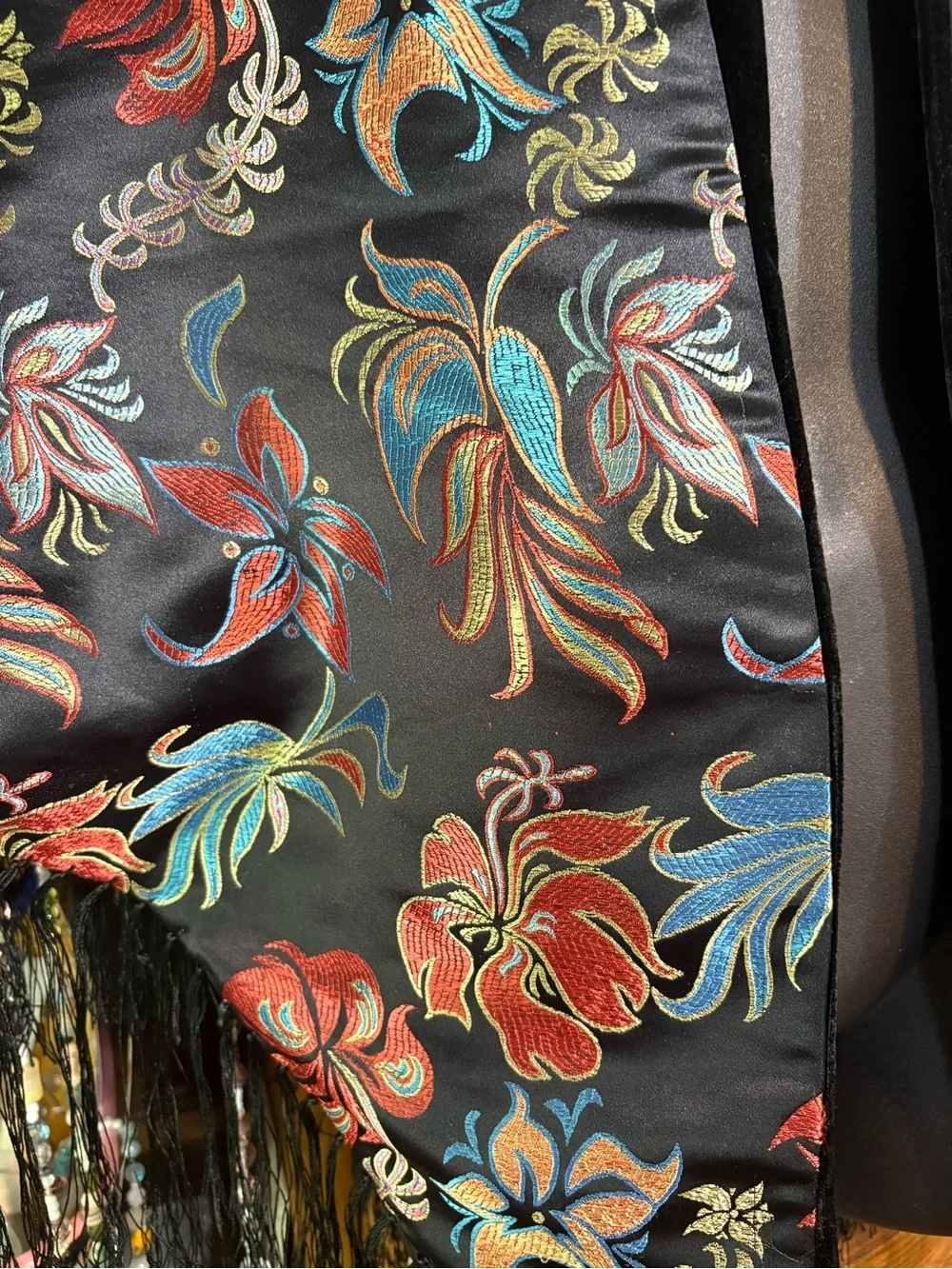 black floral embroidered silk like boho shawl featuring long fringe trim